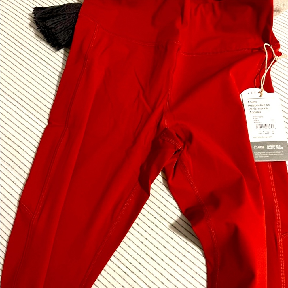 Vuori brand new never worn with tags women’s stride leggings, color is poppy!